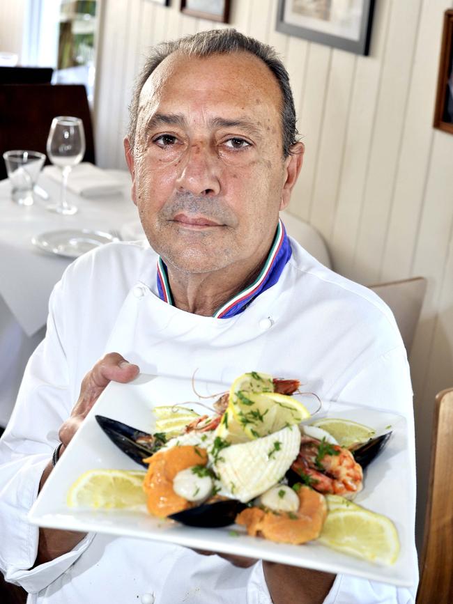 Mario Alfieri with one of his culinary delights.