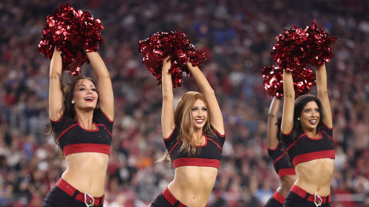 The Arizona Cardinals cheerleaders perform during the second half of the NFL game against the Los Angeles Chargers at State Farm Stadium. (Photo by Christian Petersen/Getty Images)