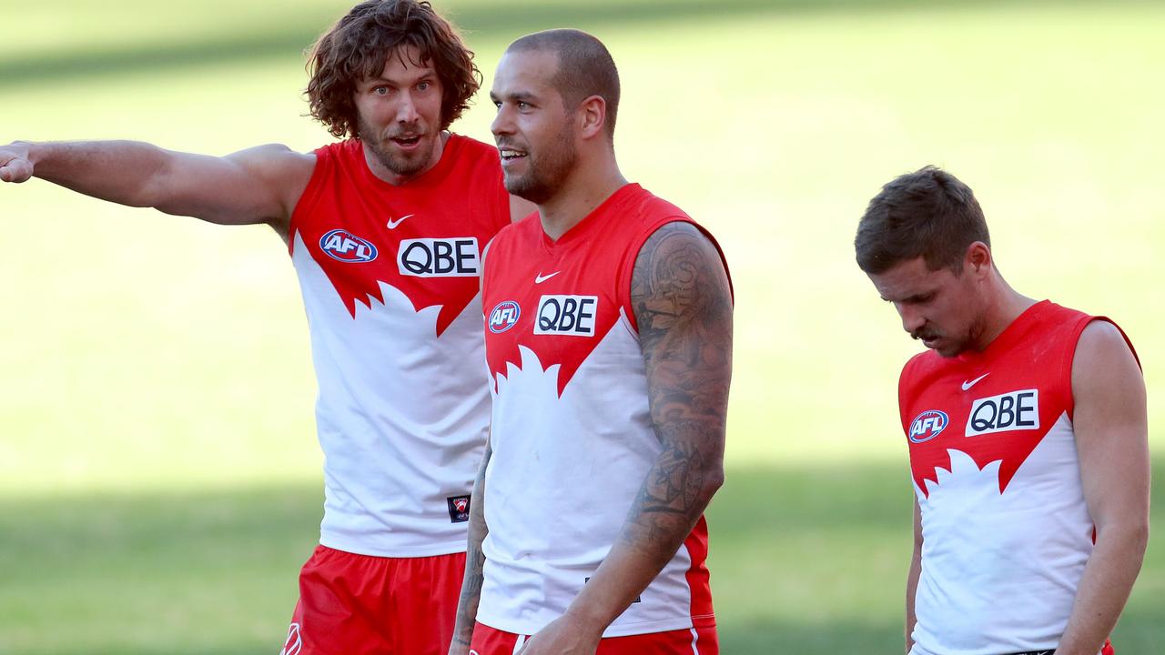 GOLD COAST, AUSTRALIA - JULY 25: Lance Franklin of the Swans and Tom Hickey of the Swans celebrate the win during the round 19 AFL match between Sydney Swans and Fremantle Dockers at Metricon Stadium on July 25, 2021 in Gold Coast, Australia. (Photo by Kelly Defina/Getty Images)