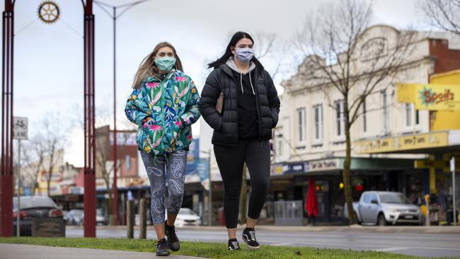 Xaliya Hancock, 19, and Chloe Rosevear, 17, in the main street of Colac. Picture: David Geraghty