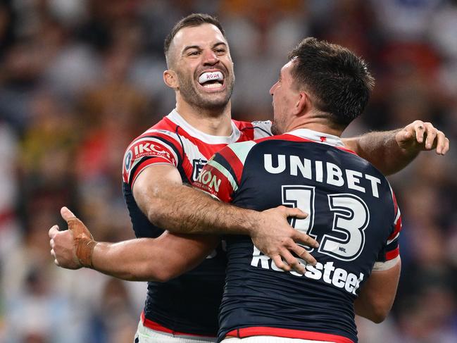 BRISBANE, AUSTRALIA - MAY 02: VictorÃÂ Radley of the Roosters celebrates scoring a try with James Tedesco of the Roosters during the round nine NRL match between the Sydney Roosters and Dolphins at Suncorp Stadium on May 02, 2025, in Brisbane, Australia. (Photo by Hannah Peters/Getty Images)