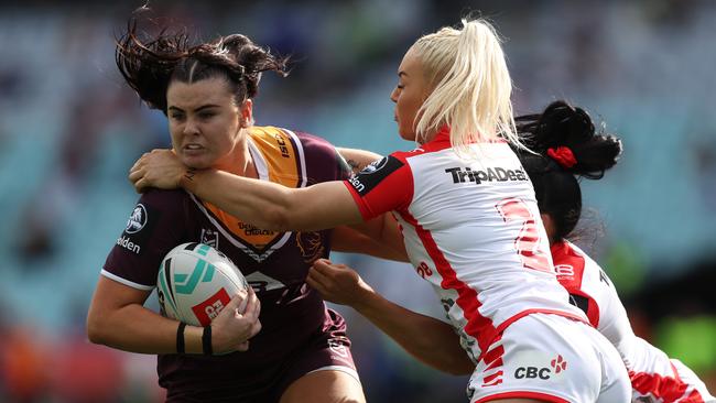 Brisbane’s Amber Pilley tries to break through St George’s Rikeya Horne. Picture: Brett Costello