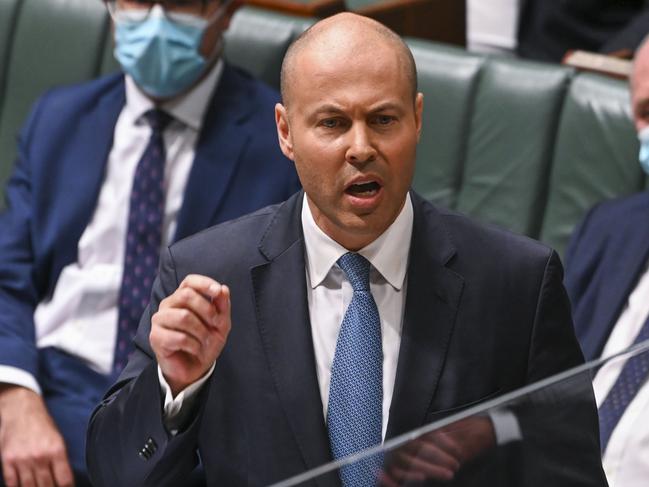 CANBERRA, AUSTRALIA - MARCH 29: Treasurer Josh Frydenberg delivers the budget in the House of Representatives at Parliament House on March 29, 2022 in Canberra, Australia. Treasurer Josh Frydenberg delivers the budget in the House of Representatives on 29 March in Canberra, Australia. The Morrison government's fourth budget has a focus on mitigating the rising cost of living with fuel excise halved, a one-off tax offset for low and middle income earners and a $250 one-off payment to pensioners, carers, veterans, job seekers, eligible self-funded retirees and concession card holders.