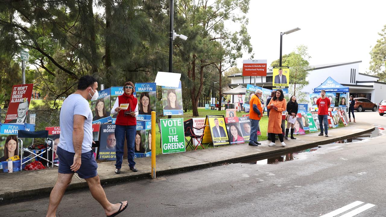 A voter arrives to a voting centre at the Homebush West Community centre in Sydney, Australia. (Photo by Mark Kolbe/Getty Images)