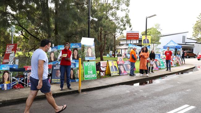 A voter arrives to a voting centre at the Homebush West Community centre in Sydney, Australia. (Photo by Mark Kolbe/Getty Images)