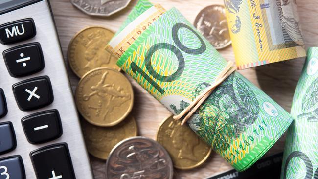 Dollar australia banknotes and coins with calculator for money concept.  Picture: istock