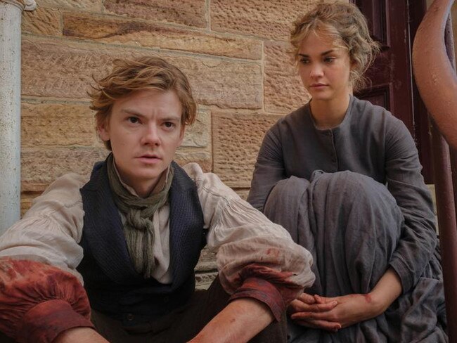 Thomas Brodie-Sangster and Maia Mitchell in a scene from The Artful Dodger.