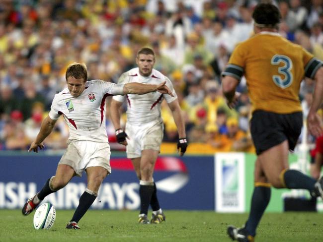 Jonny Wilkinson kicks the World Cup-winning drop goal that broke Australian hearts.