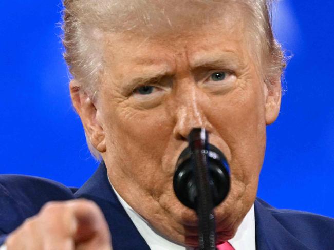 US President Donald Trump speaks at the annual Conservative Political Action Conference (CPAC) at the Gaylord National Resort & Convention Center at National Harbor in Oxon Hill, Maryland, on February 22, 2025. (Photo by Alex WROBLEWSKI / AFP)