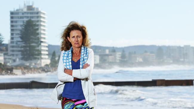 Zaza Silk pictured at Collaroy Beach looking north towards her property along the waterfront that has been affected by the recent storm. Picture: Braden Fastier