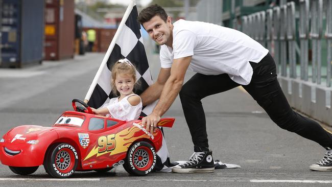 Trent Cotchin as the Grand Prix AFL Ambassador with his daughter Harper. Picture: David Caird