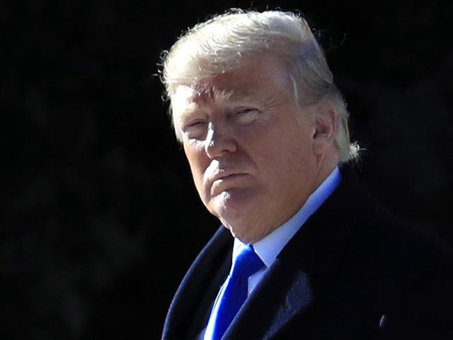 President Donald Trump walks from the Oval Office as he leaves the White House in Washington, Friday, Jan. 5, 2018, enroute to Camp David, Md., to participates in congressional Republican leadership retreat. (AP Photo/Manuel Balce Ceneta)