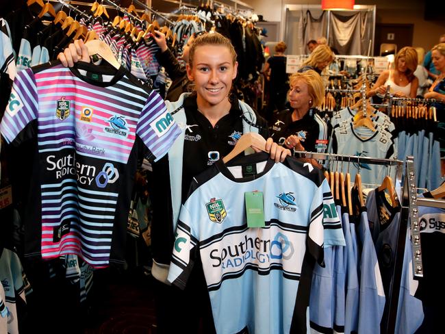 Sales assistant Elana White in the Cronulla Sharks pop up shop. Picture: Gregg Porteous