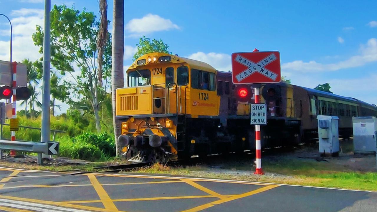 A train on the Kuranda Scenic Railway line runs through a level crossing on Whitfield St near to where a large rock was thrown at a passenger on Saturday, October 19, 2024. Picture: Peter Carruthers