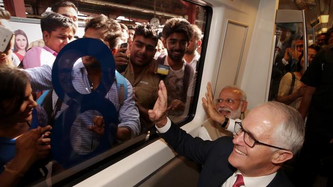 The Prime Ministers’ trip on the Delhi Metro Blue Line in New Delhi, India, attracted huge crowds. Picture: AAP