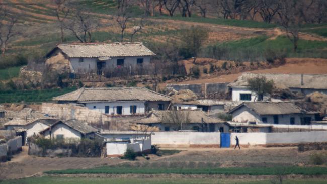 A view of fields and buildings in North Korean countryside outside Kaesong, seen across the Demilitarized Zone (DMZ) from the South Korean island of Ganghwa. The United States will keep seeking North Korea's denuclearisation no matter who is in charge in Pyongyang, Secretary of State Mike Pompeo said, amid speculation about leader Kim Jong-un's health.