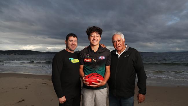 Jack Callinan, centre, with dad Ian Callinan (left) and grandfather Des James (right) who represented Tasmania in state football and is in the Tasmanian Football Hall of Fame playing club football for Sandy Bay. Picture: Nikki Davis-Jones