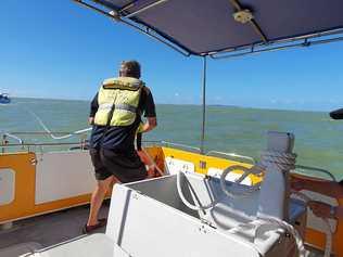 Coast Guard crew Merv Studt (left) and Marjorie Roth (right) handling the tow line after a boat broke down on Sunday. Picture: Yeppoon Coast Guard