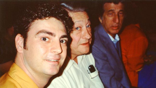 Advertiser journalist Patrick McDonald with Elvis Presley's original guitarist Scotty Moore and drummer DJ Fontana, in racquetball court at Graceland, Memphis, for the unveiling of RIAA gold and platinum records in August 1992. Picture: Patrick McDonald