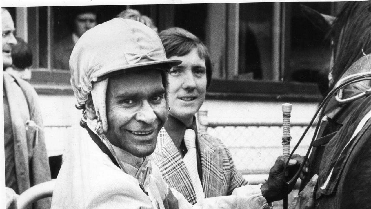 Darby McCarthy unsaddles There You Go watched by trainer Terry Courtney at Victoria Park Racecoursein 1977. Picture: File