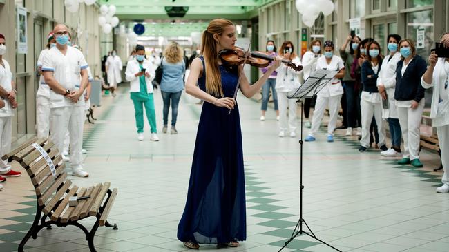 Italian violinist Fiamma Flavia Paolucci performs at Tor Vergata Hospital in Rome. Picture: AFP