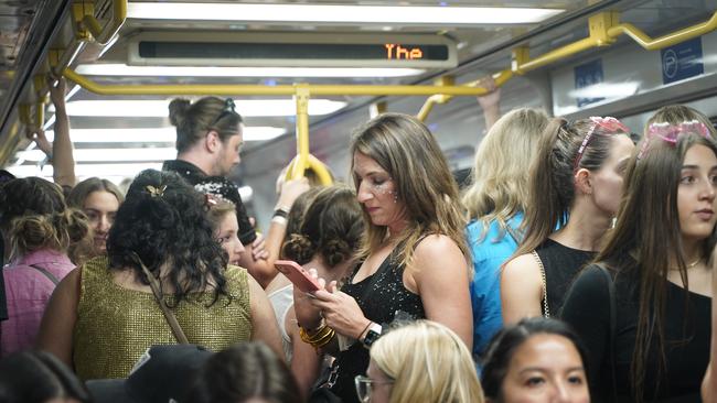 Taylor Swift fans packed out trains to the MCG for her second concert in Australia. Picture: NCA NewsWire / Valeriu Campan