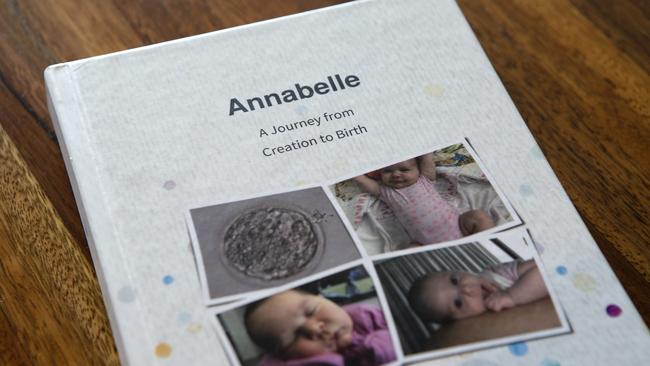 The book Stanley and Marco Oliveira-Gray had printed of the group’s two year Facebook group chat during the surrogacy process before and after seven month old Annabelle was born.