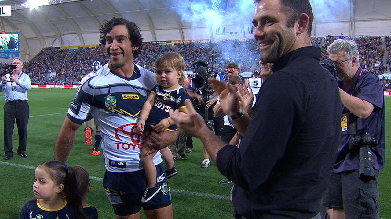 Cameron Smith claps JT onto the field for his last game.