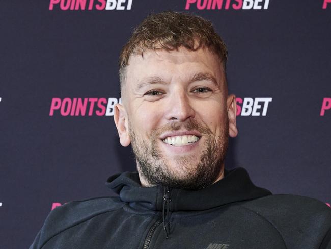 SYDNEY, AUSTRALIA - AUGUST 28: Dylan Alcott poses for a photoduring the PointsBet Built Differently Media Event at Cargo Hall on August 28, 2022 in Sydney, Australia. (Photo by Brett Hemmings/Getty Images for TLA)