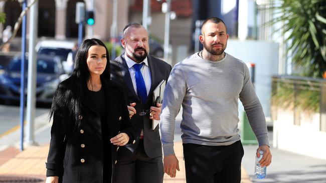 Defence Solictor Campbell McCallum, Harley Barbaro (right) and Hayley Isabella Webb (left) walk into Southport Court House. Photo: Scott Powick.