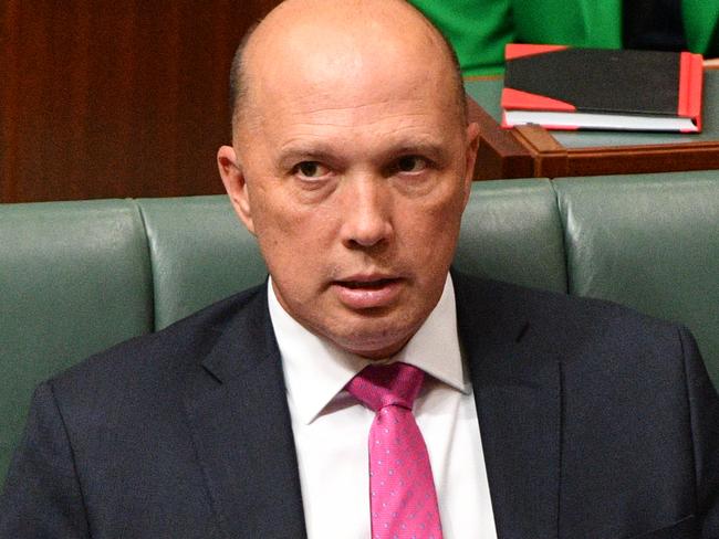 Minister for Home Affairs Peter Dutton during Question Time in the House of Representatives at Parliament House in Canberra, Wednesday, September 12, 2018. (AAP Image/Mick Tsikas) NO ARCHIVING