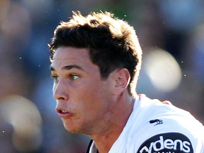 Tigers Mitchell Moses passes during the round 1 NRL game between the Wests Tigers and the New Zealland Warriors at Campletown Stadium.Picture Gregg Porteous