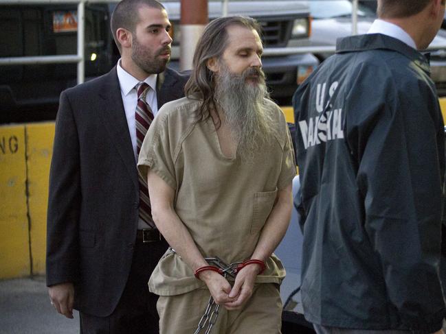 Brian David Mitchell is escorted into the Frank E Moss Federal Courthouse in Salt Lake City, Utah, in NoVember 2010.