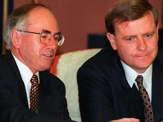 JOHN HOWARD (liberal) IN HIS FIRST CABINET MEETING IN CANBERRA TODAY WITH TIM FISCHER (national) AND PETER COSTELLO (liberal). PICLYNDON/MECHIELSEN mar 1996 headshot right