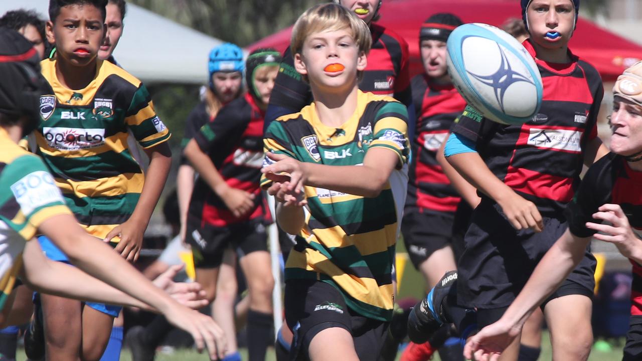 King of the Country U/13 Rugby Union tournament at Overall park Southport. Surfers Paradise(Yellow Green ) V Far North Coast (red black). Picture Glenn Hampson