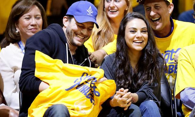 OAKLAND, CA - JUNE 05: (L-R) Actors Ashton Kutcher and Mila Kunis attend Game 2 of the 2016 NBA Finals between the Golden State Warriors and the Cleveland Cavaliers at ORACLE Arena on June 5, 2016 in Oakland, California. NOTE TO USER: User expressly acknowledges and agrees that, by downloading and or using this photograph, User is consenting to the terms and conditions of the Getty Images License Agreement. (Photo by Ezra Shaw/Getty Images)