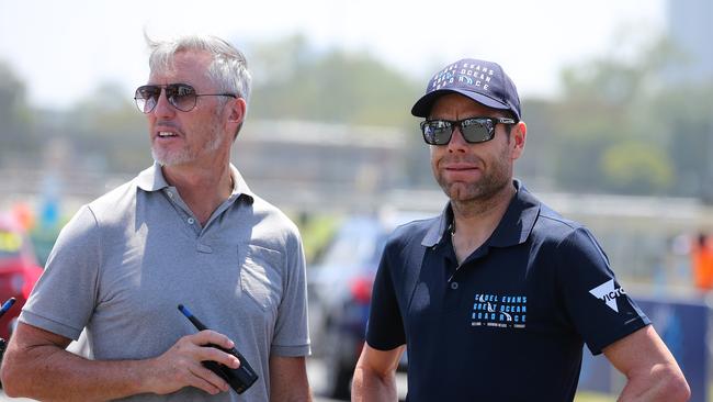 Scott Sunderland with Cadel Evans. Picture: Kei Tsuji/Tim De Waele/Getty Images.