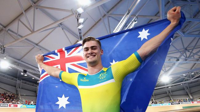 Matt Glaetzer of Australia celebrates a games record time after he competes and wins the Men's 1000m time trial. Picture: Dean Mouhtaropoulos/Getty Images