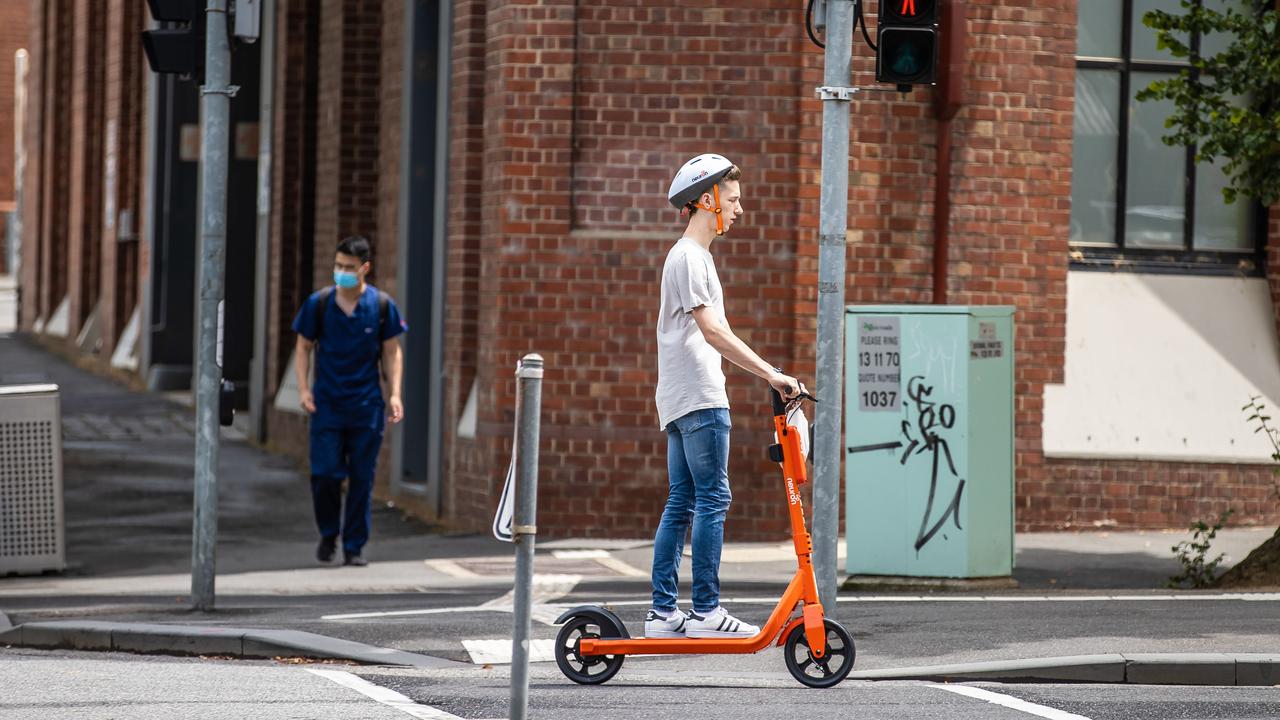 An e-scooter is ridden on a road in Melbourne. Picture: Jason Edwards