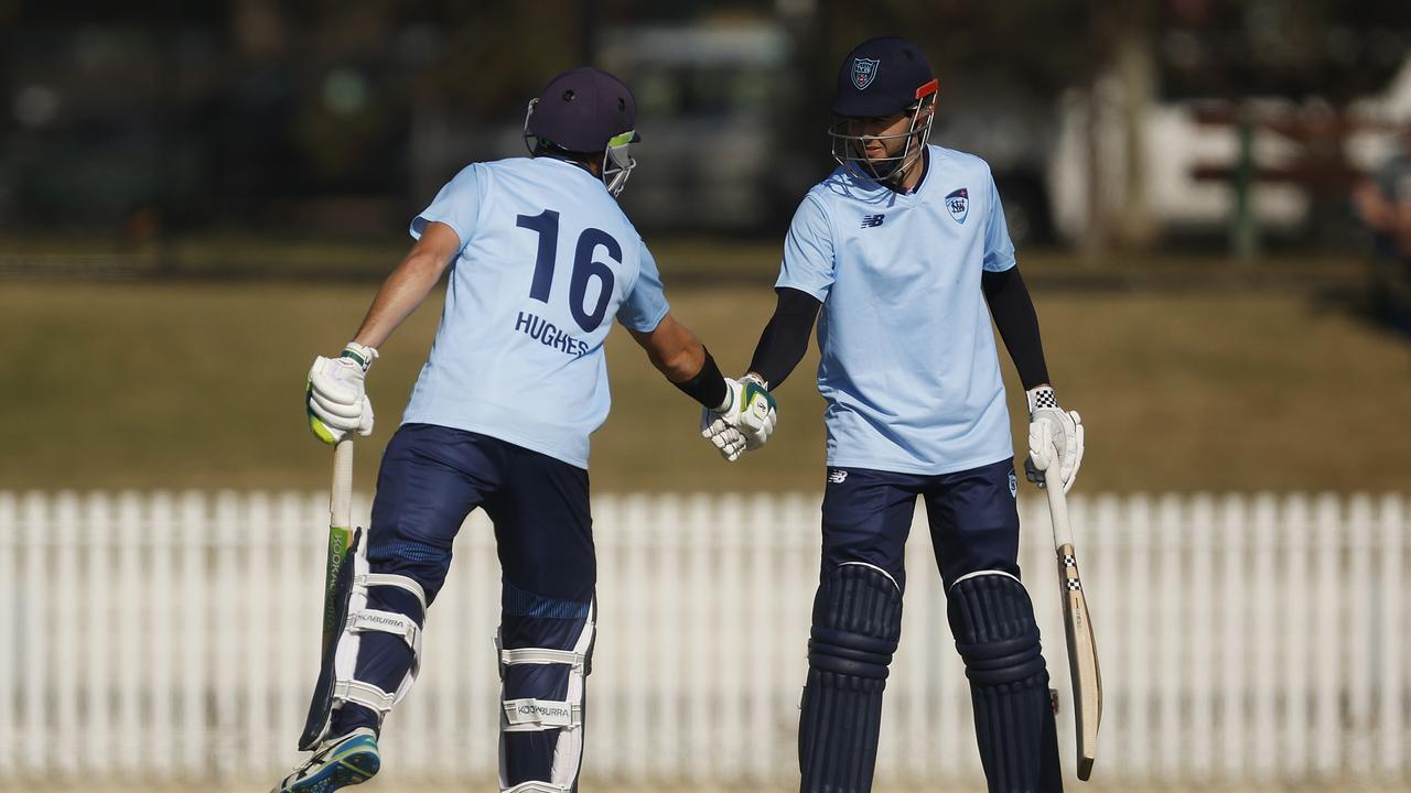 Daniel Hughes of New South Wales bumps gloves with Kurtis Patterson. Photo by Daniel Pockett/Getty Images