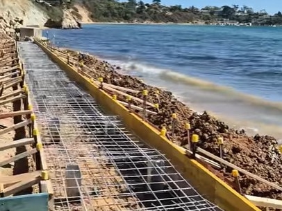 Locals are confused after reportedly unauthorised construction began in one Melbourne's most popular beach destinations, leaving the council stumped where it came from.