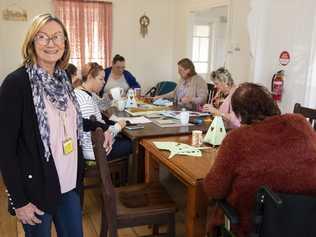 IMPACT staff member Wendy Lindeman with the Cooee group at IMPACT’s Independence House. Picture: Tahlia Stehbens.