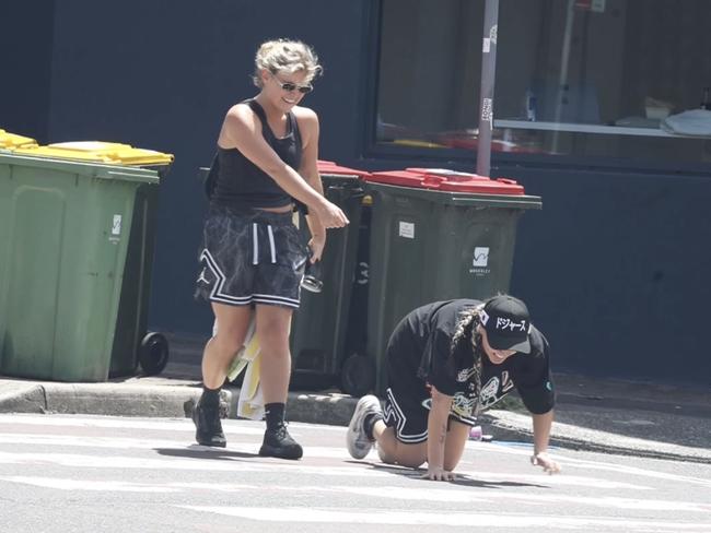 JoJo Siwa and her partner Kath Ebbs have been spotted engaging in a bizarre act in Bondi.