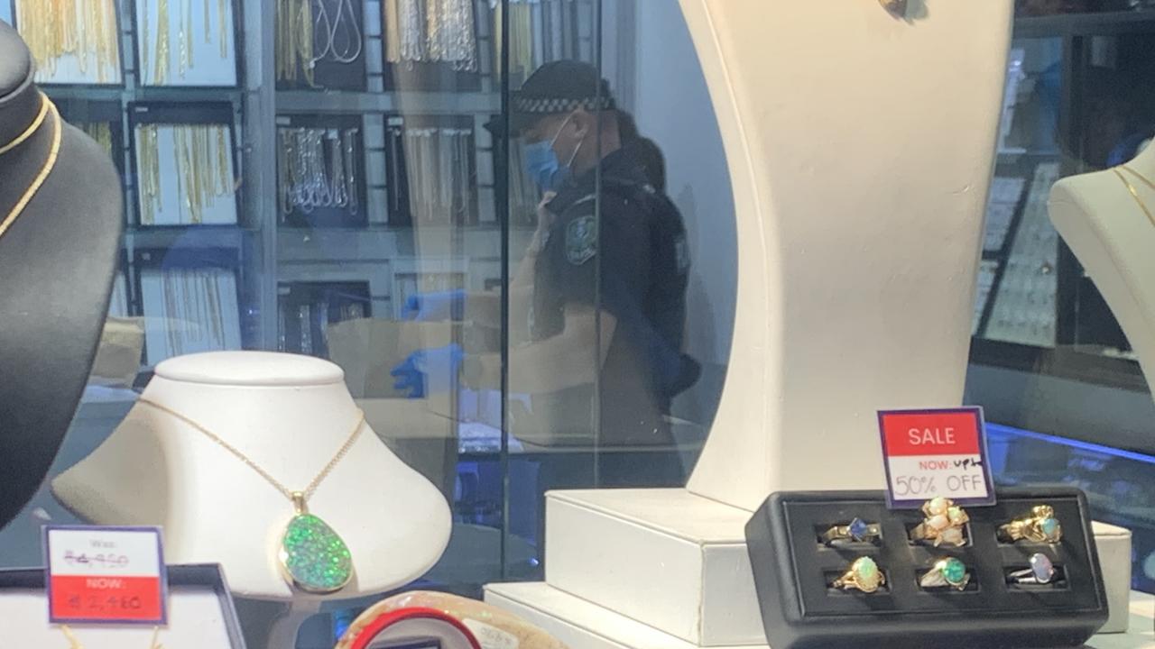 Woman charged after CBD jewellery store robbed | Herald Sun