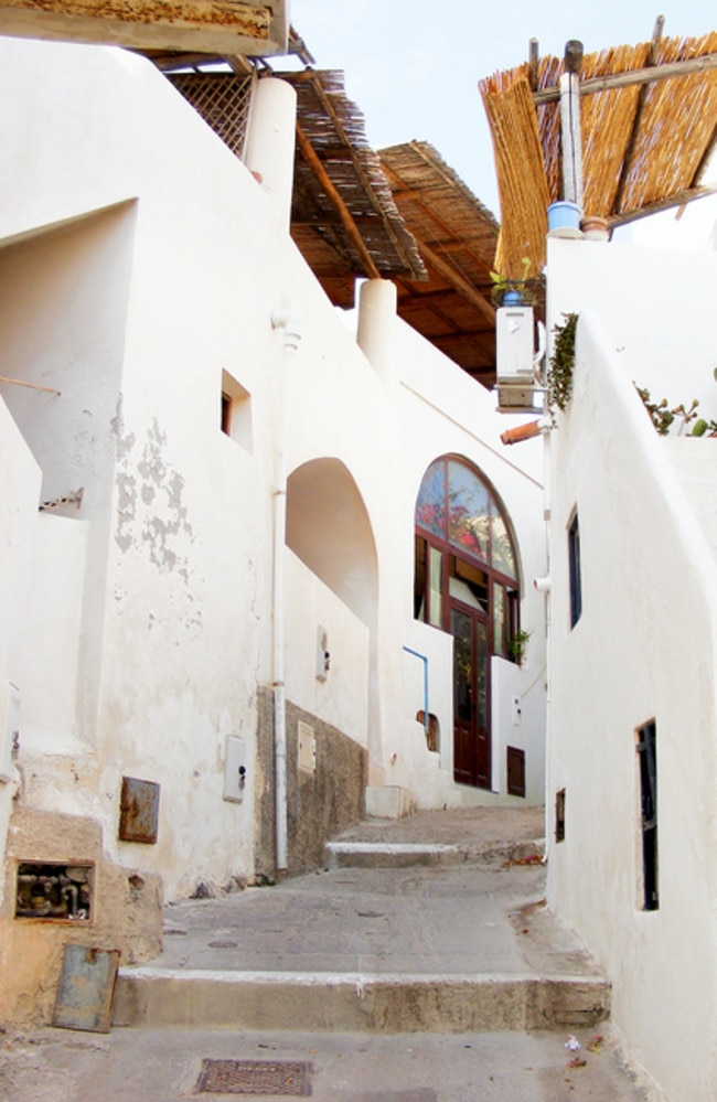 Narrow alley on Alicudi island. Eolie archipelago. Sicily. Italy