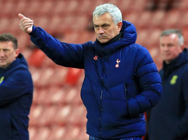 Tottenham Hotspur's Portuguese head coach Jose Mourinho gestures from the sidelines during the English League Cup quarter final football match between Stoke City and Tottenham Hotspur at the bet365 Stadium, in Stoke on Trent on December 23, 2020. (Photo by Lindsey Parnaby / AFP) / RESTRICTED TO EDITORIAL USE. No use with unauthorized audio, video, data, fixture lists, club/league logos or 'live' services. Online in-match use limited to 120 images. An additional 40 images may be used in extra time. No video emulation. Social media in-match use limited to 120 images. An additional 40 images may be used in extra time. No use in betting publications, games or single club/league/player publications. /