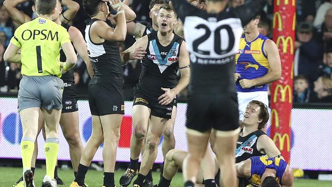 A high tackle from Jared Polec on Luke Shuey results in the goal that sinks Port Adelaide in extra time in last year’s finals series. Picture Sarah Reed