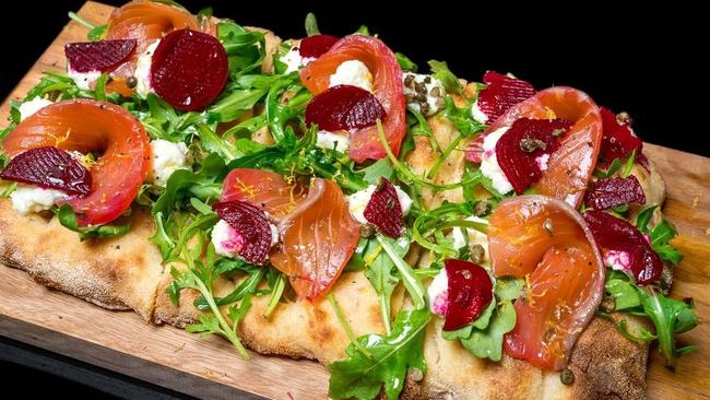 A cured salmon and beetroot pinsa at Doughcraft in Brisbane CBD.