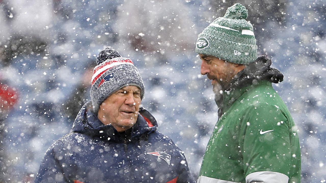 Patriots head coach Bill Belichick and Rodgers during their last game of the regular season on January 7. (Photo by Winslow Townson/Getty Images)