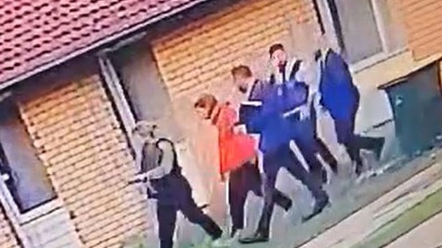 Security footage of Crystal Nowland, mother of deceased six-year-old girl Charlie, flanked by detectives as she’s led away from her Munno Para home. Picture: Supplied